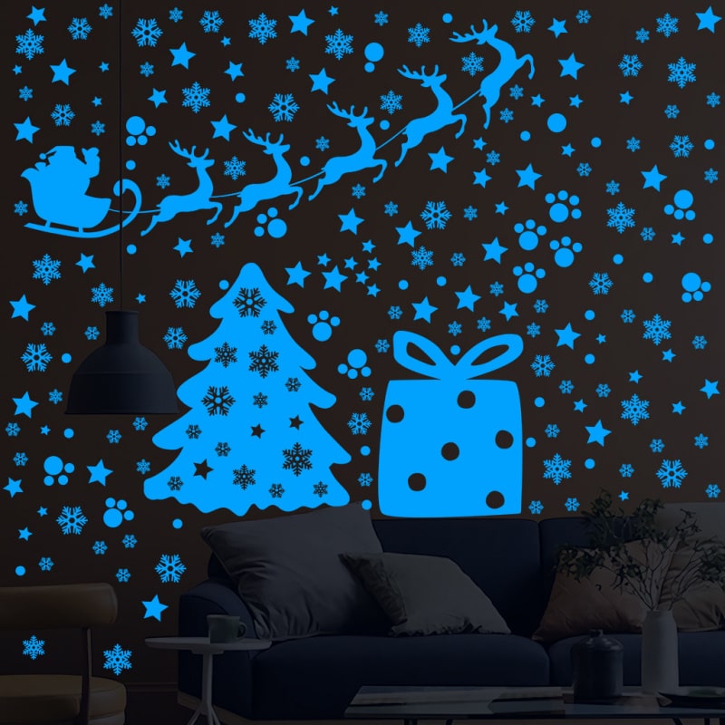 Billede af Selvlysende jule wallsticker med julemand, rensdyr, juletræ, sne, stjerner mm.